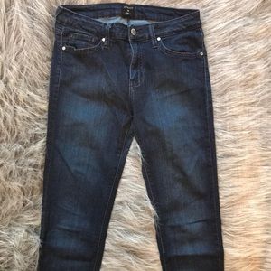 Mid-rise dark wash denim. Size 28.